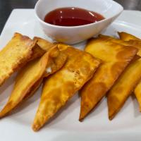 A7 Moon Crab · Mixed imitation crab meat, cream cheese, and green onion wrapped in Wonton sheet served with...