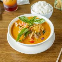C7 Duck Curry · Red curry paste with roasted duck, eggplant, bamboo shoot, pineapple, bell pepper, tomato, a...