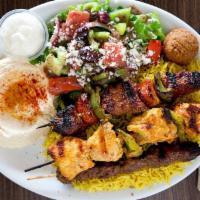 Green Corner Plate Combo · One skewer of lamb kifta kabob, chicken kabab, four beef chunk and one falafel served with r...