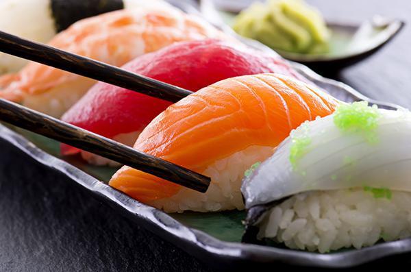 Sushi Appetizer · An assortment of tuna, salmon and white tuna. Five pieces.