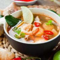 Tom Yum Soup · Lemongrass soup with lime juice and straw mushrooms.