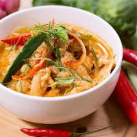 Panang Curry · The most popular Thai curry with bell pepper, fresh basil leaves, coconut milk and peanut pa...