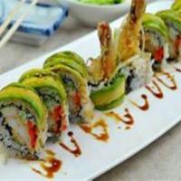 Magic Dragon Roll · Shrimp tempura, tempura eel, light cream cheese, asparagus and roe topped with sliced avocad...