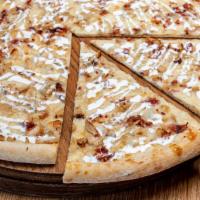 California Love Pie · Bacon, chicken, homemade ranch and caramelized onions on our garlic paste.