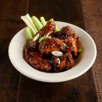 Jumbo Chicken Wings · Tossed in your choice of Bogey's Buffalo, sweet BBQ or house made Bravo sauce.