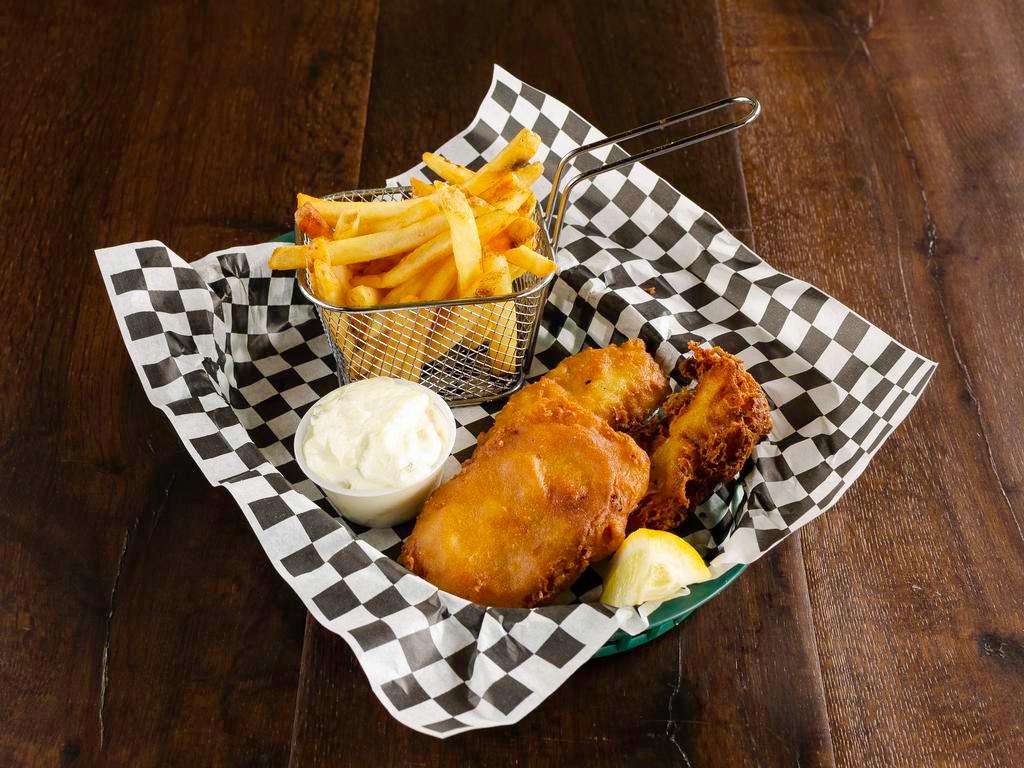 Fish and Chips · 3 Alaskan cod fillets battered and fried till golden, served atop a pile of fries with tartar sauce for dipping.