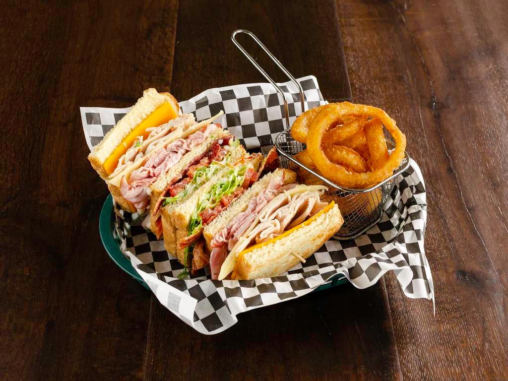 Perfect Club · Ham, turkey, bacon, lettuce, tomato, Swiss, cheddar and mayo. Served on toasted sourdough.