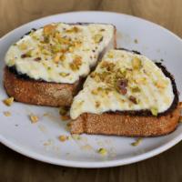 Fig and Ricotta Toast · fig confit & ricotta cheese topped with honey & toasted pistachios