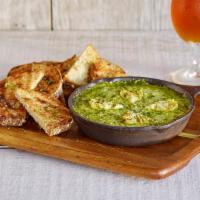 Baked Spinach & Artichoke Dip · House-made spinach and artichoke dip topped with parmesan cheese & baked, served with grille...