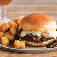Chimay Burger · Fresh Angus beef piled high with Chimay cheese, sauteed mushrooms, caramelized onions & garl...