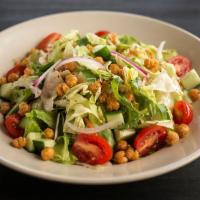 House Salad · Mixed Greens, grape tomatoes, shredded carrots, cucumbers & red onions, tossed in our house ...