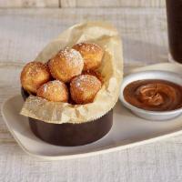 Nutella Churro Donuts · Fresh fried donut bites tossed in cinnamon sugar & served with a side of Nutella®.