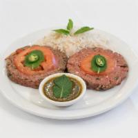 2 Patties Chappli Kabobs · Flattened ground beef patties cooked over a bed of thinly sliced onions, green peppers, toma...