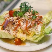 15. Yum Woon Sen Salad · Steamed prawns and coarse chicken breast tossed with glass noodles, red onion, cilantro, fre...