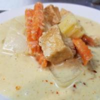 37. Yellow Curry · Potatoes, onion, pineapple, and carrots cooked in coconut milk and yellow curry paste.