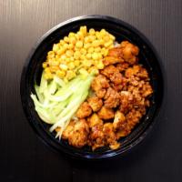 Crispy Black Pepper Chicken Rice Bowl黑椒炸鸡饭 · Crispy Fried Chicken with black pepper sauce over rice. side with corns and cucumbers