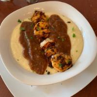 1. Creole Shrimp and Grits Combo · Creamy grits with cheese topped with blackened shrimp and perfectly seasoned creole sauce se...