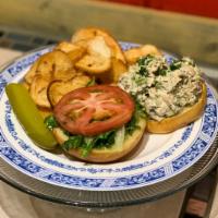 Chunky Chicken Salad Sandwich in Brioche Bun Lunch · Mayo, dill, lettuce, and tomato.