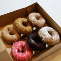Half Dozen  · A mix of 6 cake donuts chosen by your baker!