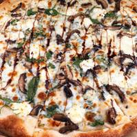 The Goat Pizza · Crimini Mushrooms, Fresh Spinach, Goat Cheese, Garlic, Mozzarella Cheese and Balsamic Glaze ...