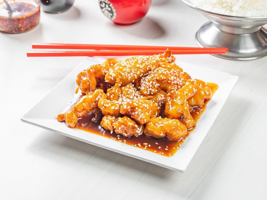 Sesame Chicken · Chunks of deep-fried battered chicken, cooked in a rich sauce and topped with sesame seeds.