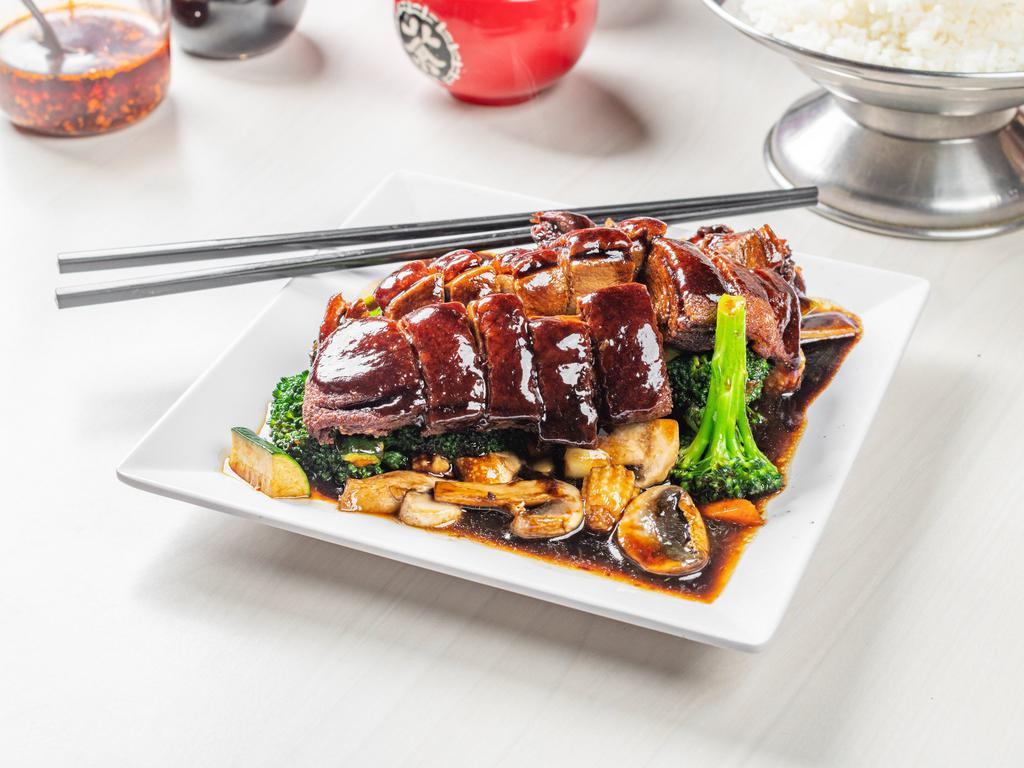 Duck with Vegetables · Duck and mixed vegetables with a rich brown sauce.
