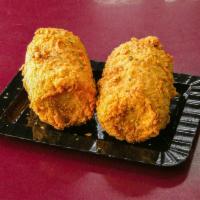 2 Pieces Fried Corn on the Cob · Deep fried, seasoned to perfection