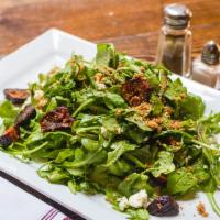 Arugula Salad  · Baby arugula, shaved fennel, blue cheese, candied walnuts and fig balsamic.
