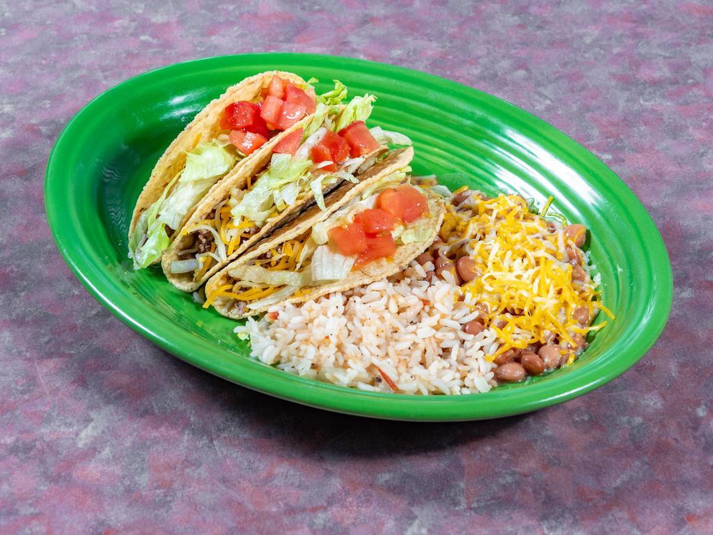 Tacos Beef · 3 Beef Tacos topped with cheese , lettuce , served with beans and riced , and salsa