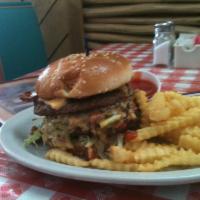 Pablo's Burger · 2 patties, bacon, cheese, tomatoes, guacamole, and sauteed jalapenos with french fries and c...