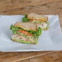Kailua Club Sandwich · Turkey, avocado, Monterey jack cheese with lettuce, tomato, sprouts, mustard and mayo on mul...