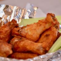 12 Piece Fresh Baked Wings · Comes with choice of dipping sauce and flavor.