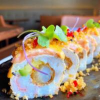 Doral Roll · Shrimp tempura, crab salad, avocado and cream cheese. Wrapped in soy paper and topped with s...