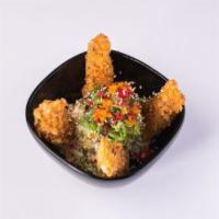 Crunchy Salad · Kani salad, prawns tempura, wakame and sesame oil.