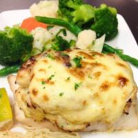 Stuffed Orange Roughy · 
Orange Roughy stuffed with our Crabcake mix and topped with imperial sauce then baked to pe...