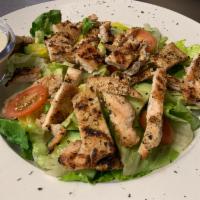 Caesar Salad with Chicken · Crispy romaine with croutons, sliced tomatoes, olives, and mixed with creamy Caesar dressing.