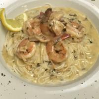 Shrimp Scampi · Garlic and white wine sauce over pasta.