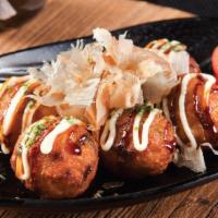 A14. Takoyaki · 5 pieces. Osaka-style deep-fried octopus ball. Served with takoyaki sauce, mayonnaise and bo...
