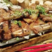 A15. BBQ Short Ribs · 2 pieces. Sweet and juicy Korean-style BBQ short rib marinated in house soy sauce.