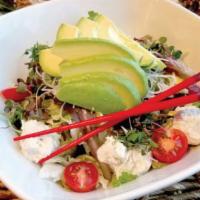 S8. Blue Crab Avocado Salad · Blue crab and avocado on a bed of greens. Served with daikon radish and tomatoes.