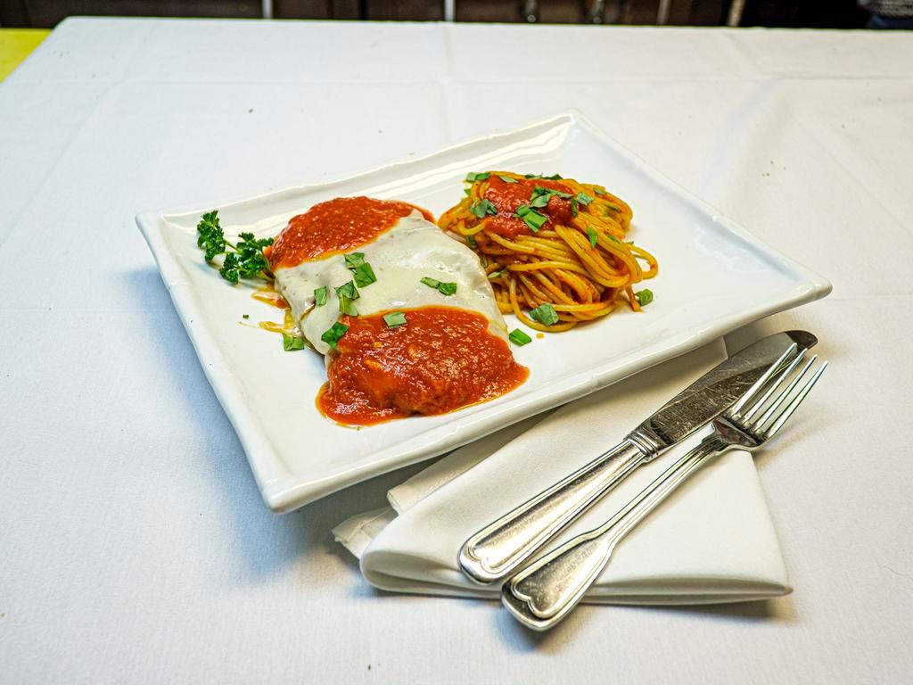 Veal Parmigiana · Lightly breaded veal with melted mozzarella cheese and marinara.