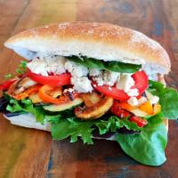 Mediterranean Roasted Veggies Sandwich - Single  · Roasted veggies (peppers, zucchini, mushrooms, onion, garlic), fresh tomatoes and greens, ba...