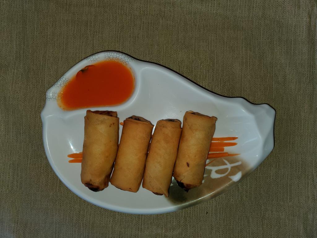 4 Pieces Crispy Spring Roll · Glass noodles, carrot, cabbages served with plum sauce.