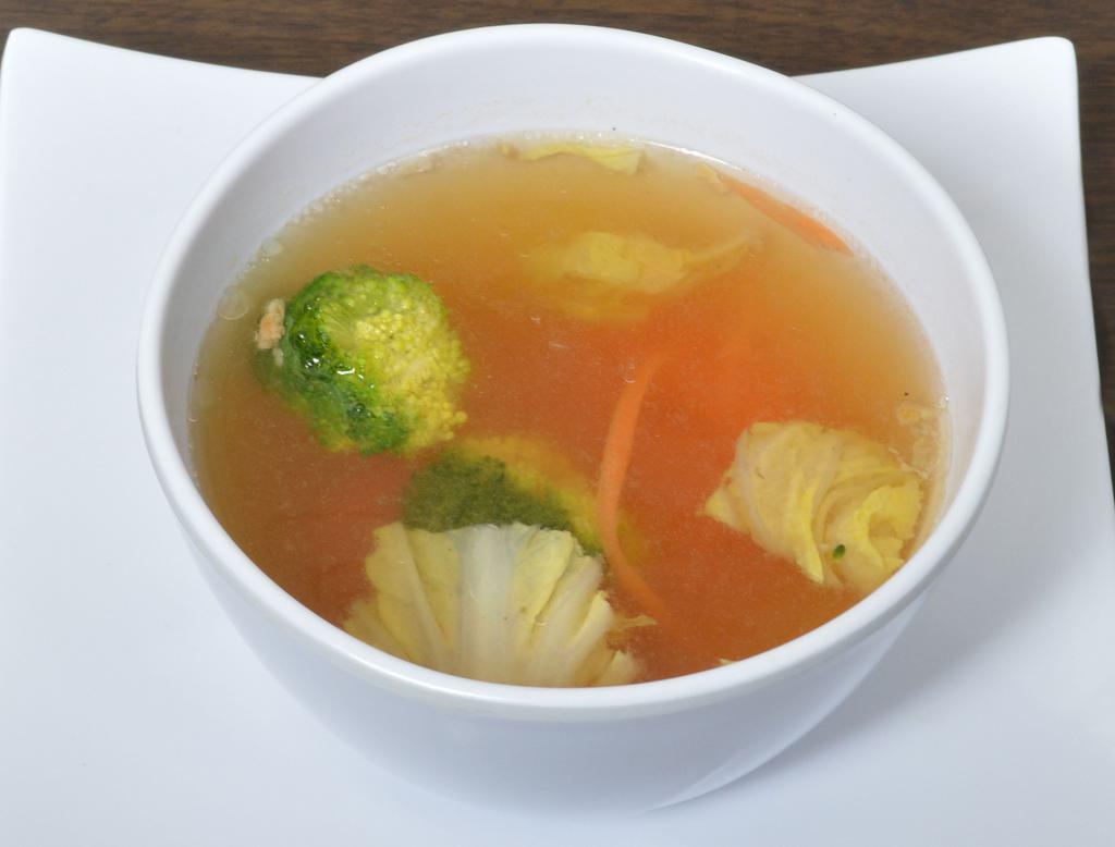 Lemongrass Tom Yum Soup · Served with chicken, onion, bell, mushroom, tomato, lemongrass, galanga and cilantro.