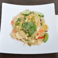 Basil Fried Rice · Fried rice with fresh basil, egg, onion, bell, string bean and carrot.