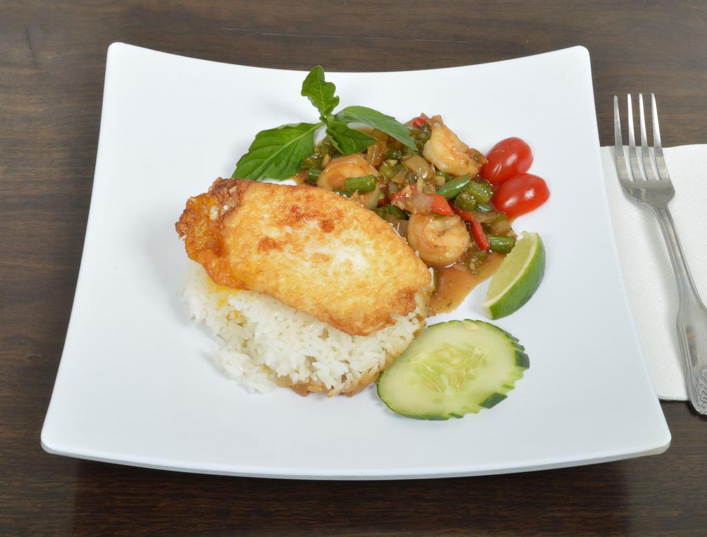 Tofu Gra-Prow · Fried tofu sauteed with fresh basil, garlic and carrot, string bean, bell pepper and onion. Served with rice.