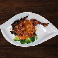 BBQ Grilled Chicken · Grilled 1/2 chicken topped with house BBQ sauce. 