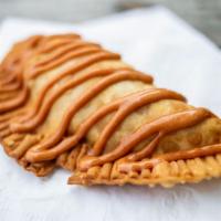 Empanadas  · Large empanadas - Fillings include: Chicken, beef, cheese, pork and cheese, ham and cheese, ...