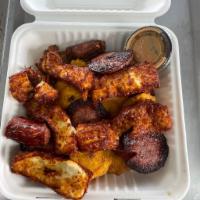 Fritura Standard  · Per person. Tostones, longaniza, salami and salsa delight. Add cheese for an additional char...