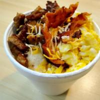 Grits bowl · Grits bowl with eggs, bacon, sausage and cheddar cheese